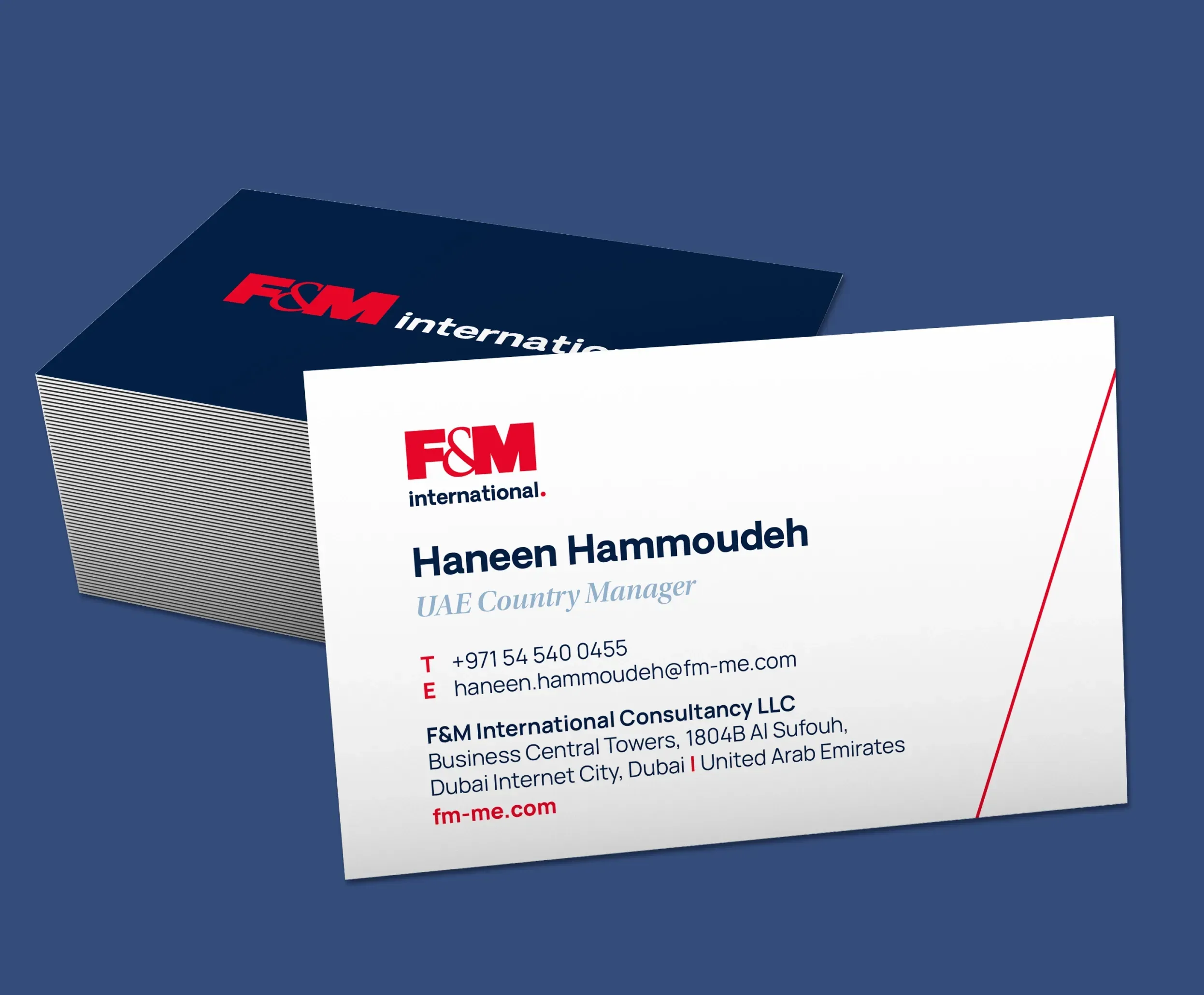 F&M International business cards, showcasing contact details and branding by Skyne. 