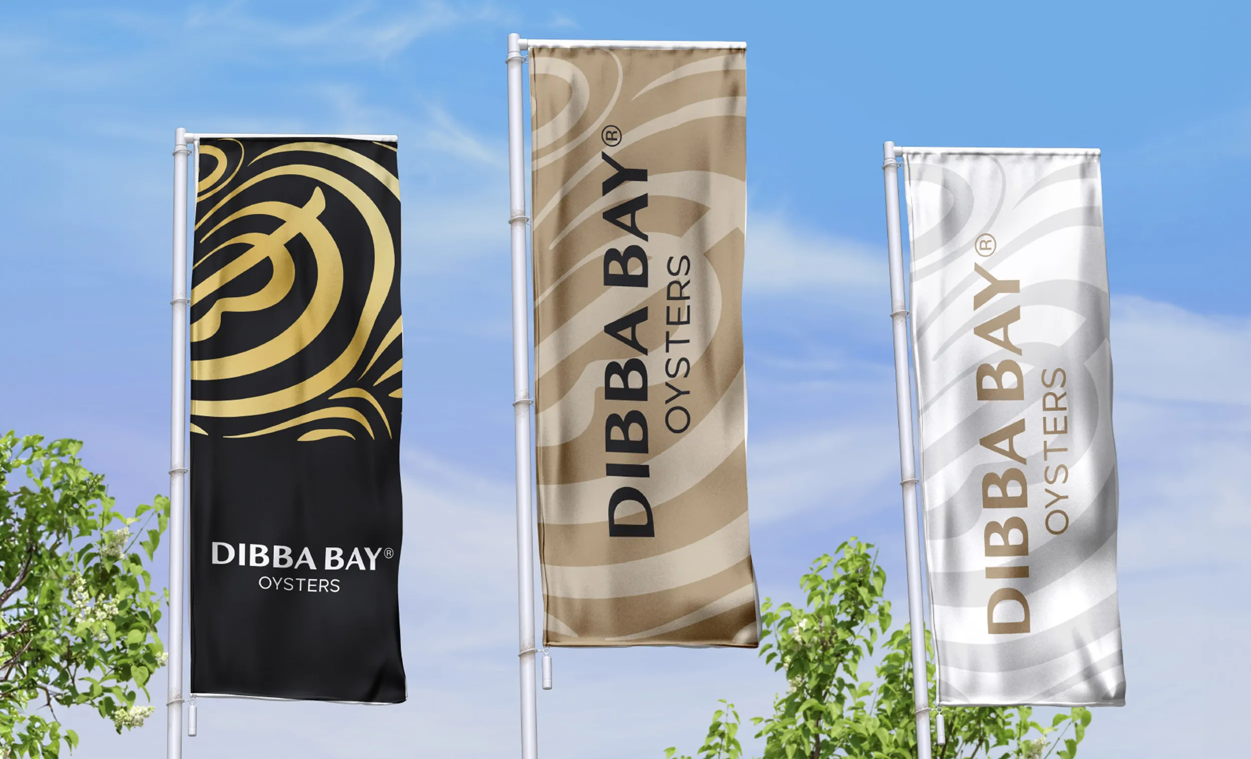 Three Dibba Bay Oysters flags with elegant branding designs waving against a blue sky, featuring black, beige, and white themes.
