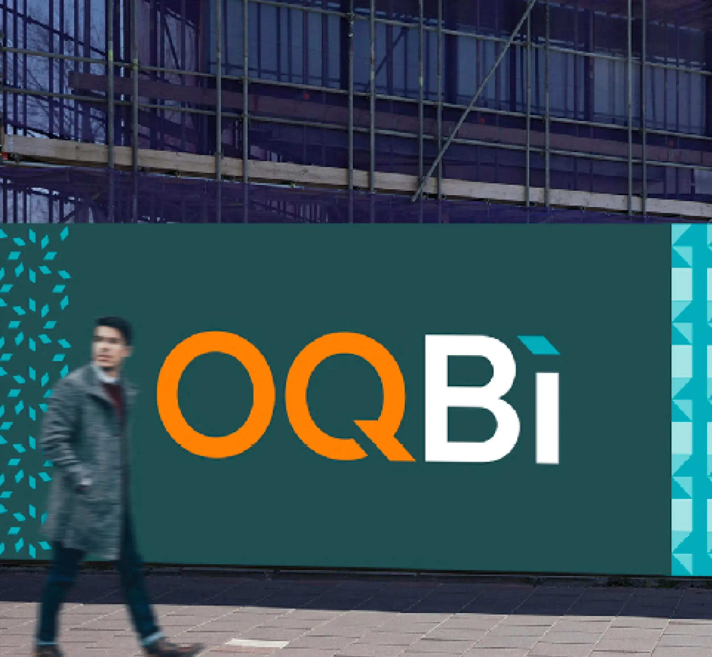 Large outdoor billboard for OQBi with logo and text about sustainability. Skyne, a branding agency, creates impactful outdoor advertising campaigns and visual communication for energy sector clients in Dubai, Riyadh, and Jeddah.