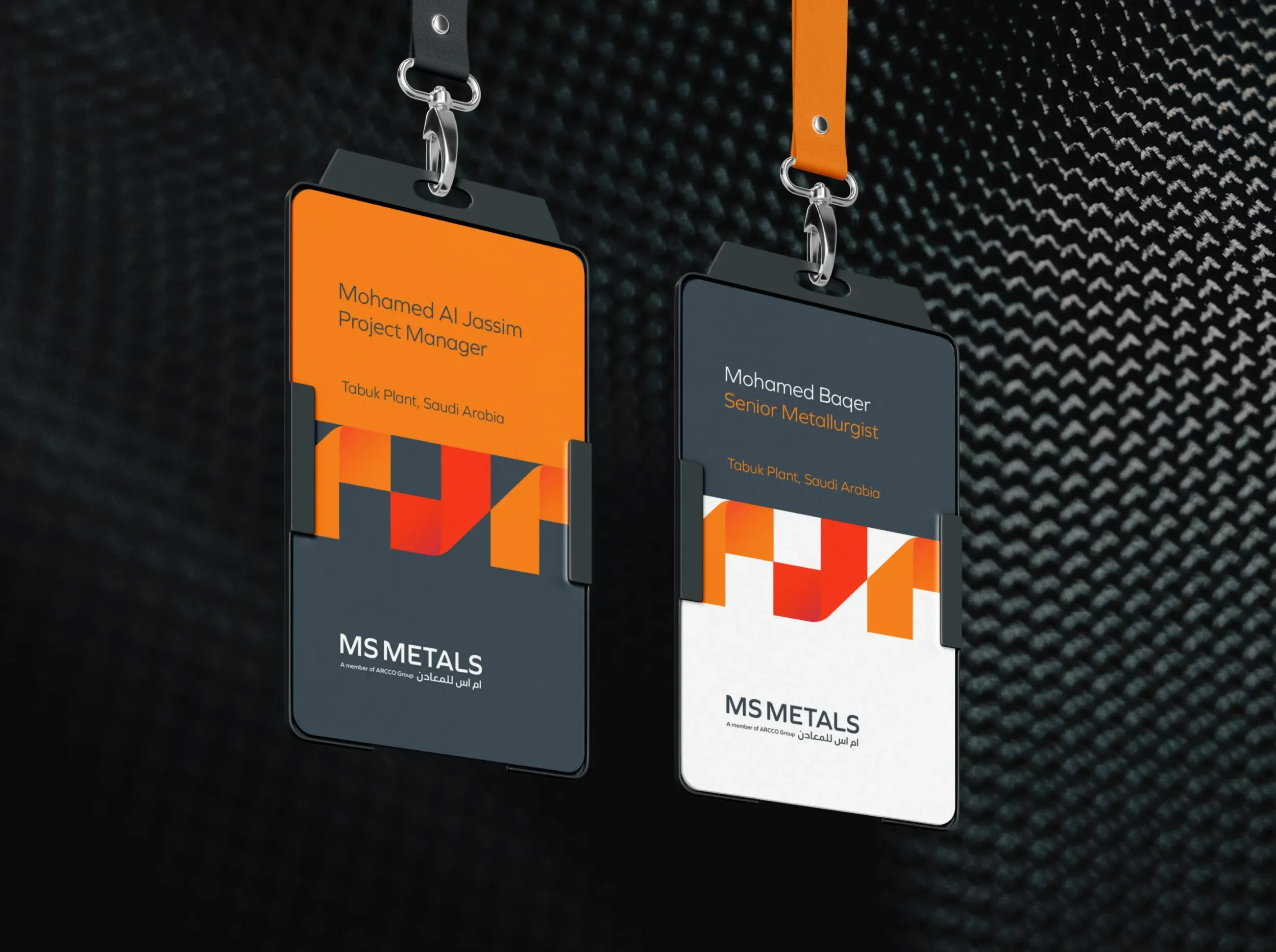 Two MS Metals employee ID badges with new branding, showcasing consistent application across corporate materials by Skyne, a branding agency in Dubai.