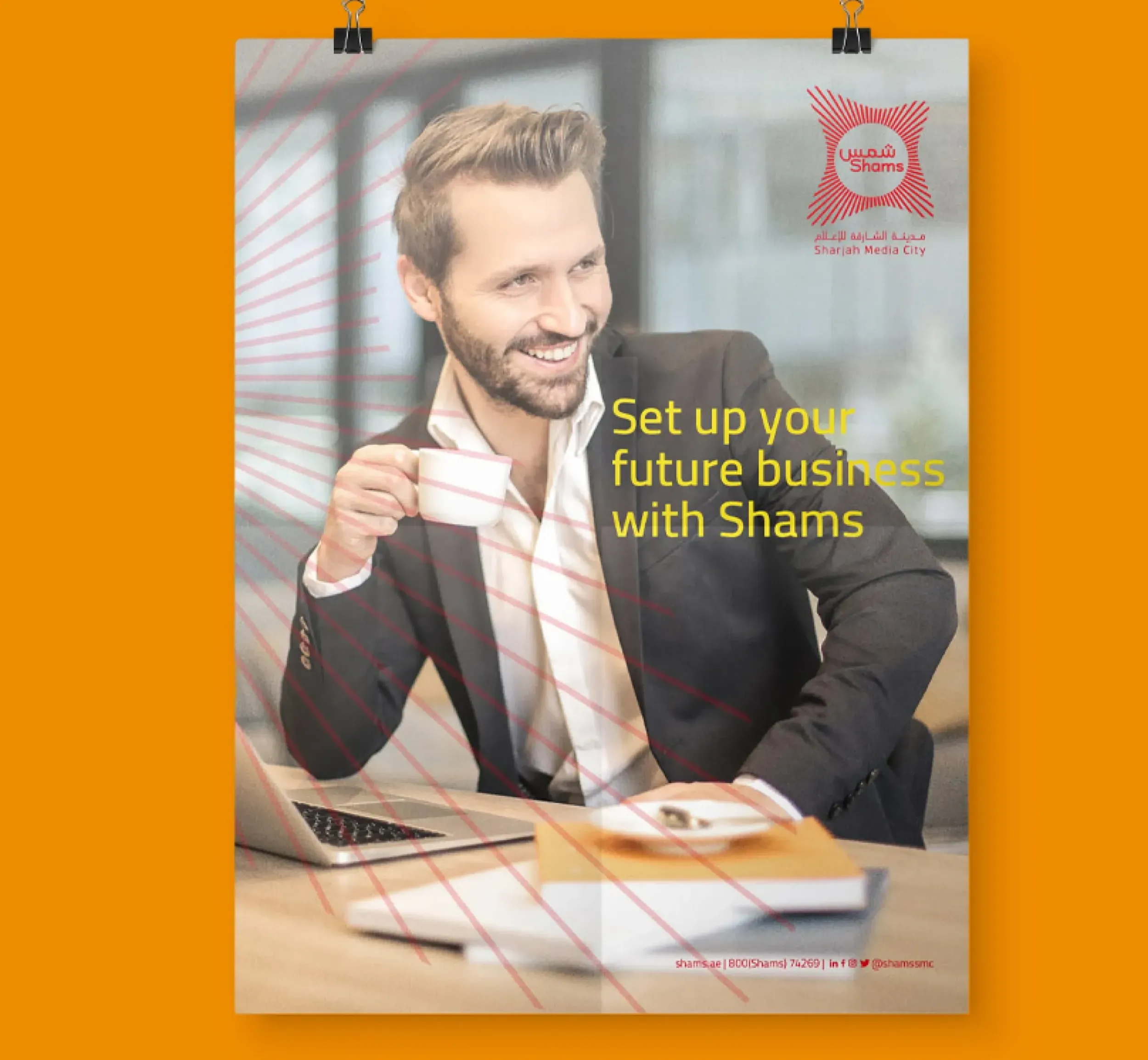 Promotional poster featuring a smiling businessman holding a coffee cup with the text 'Set up your future business with Shams