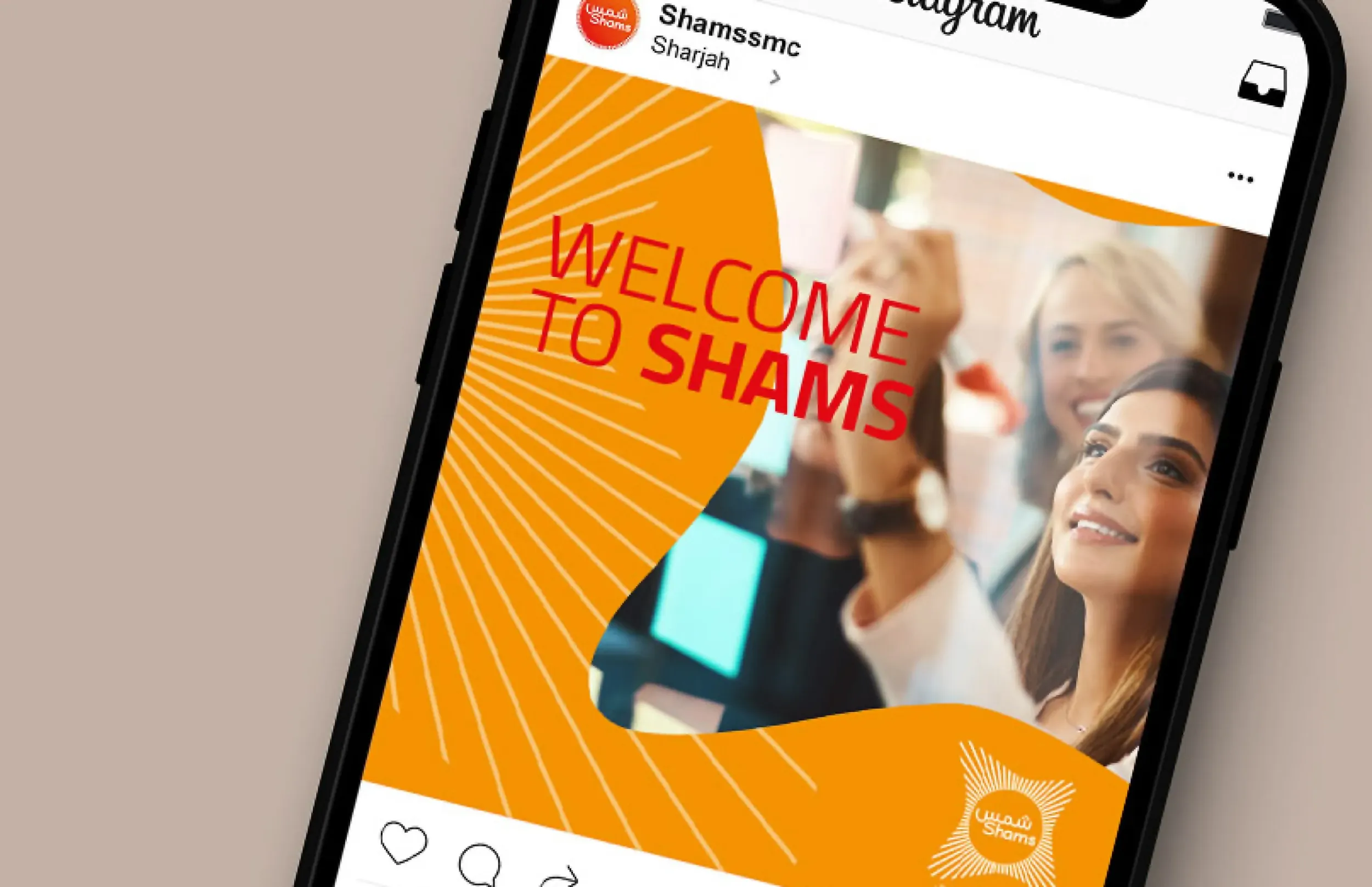 Smartphone displaying Shams Media City Instagram post, showcasing digital engagement. Skyne, a creative agency, developed the brand for social media. 
