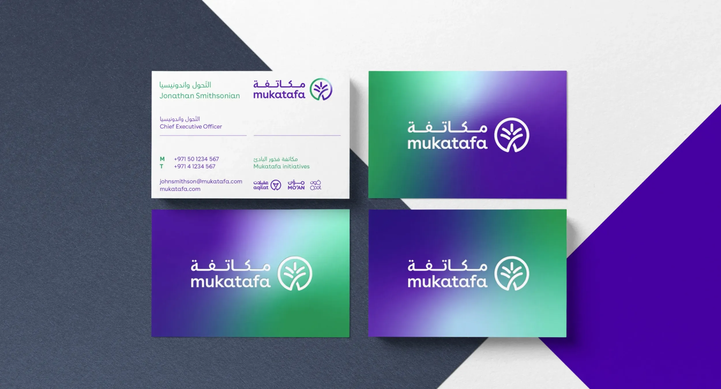 Mukatafa business cards with bilingual branding and gradient design, created by Skyne branding agency as part of the identity system
