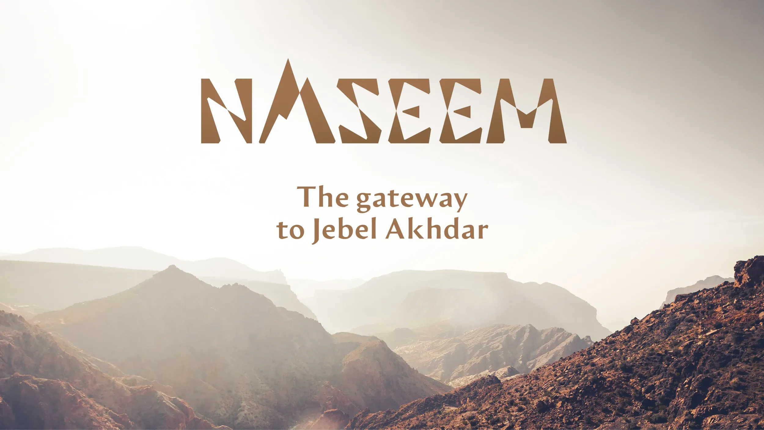 Naseem brand logo and tagline against Omani mountains. This showcases Skyne's branding expertise, a creative agency specializing in destination branding and packaging design.