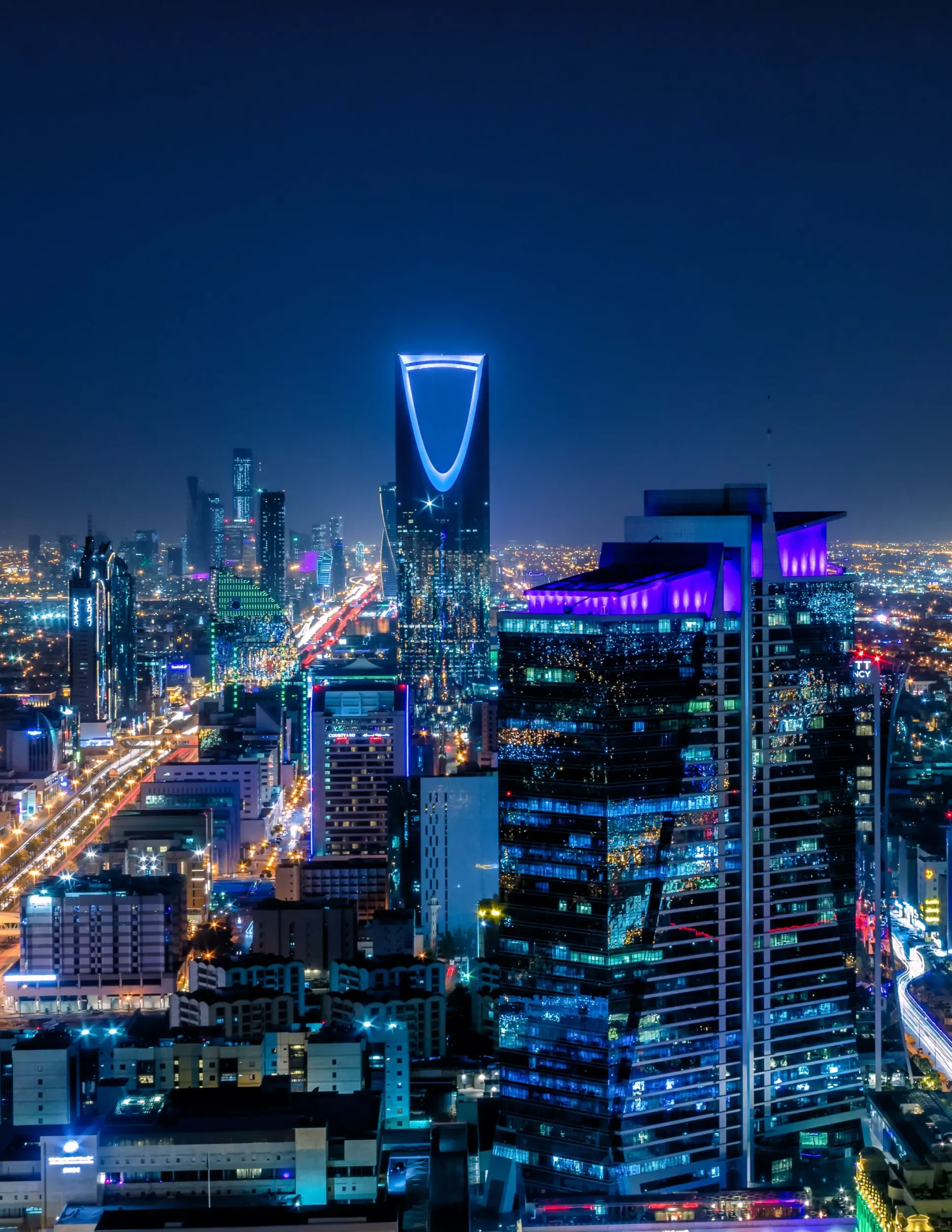 Riyadh cityscape at night, symbolizing the modern financial landscape of Saudi Arabia. Skyne, a branding agency, positioned Yaqeen Capital for leadership in this market. 