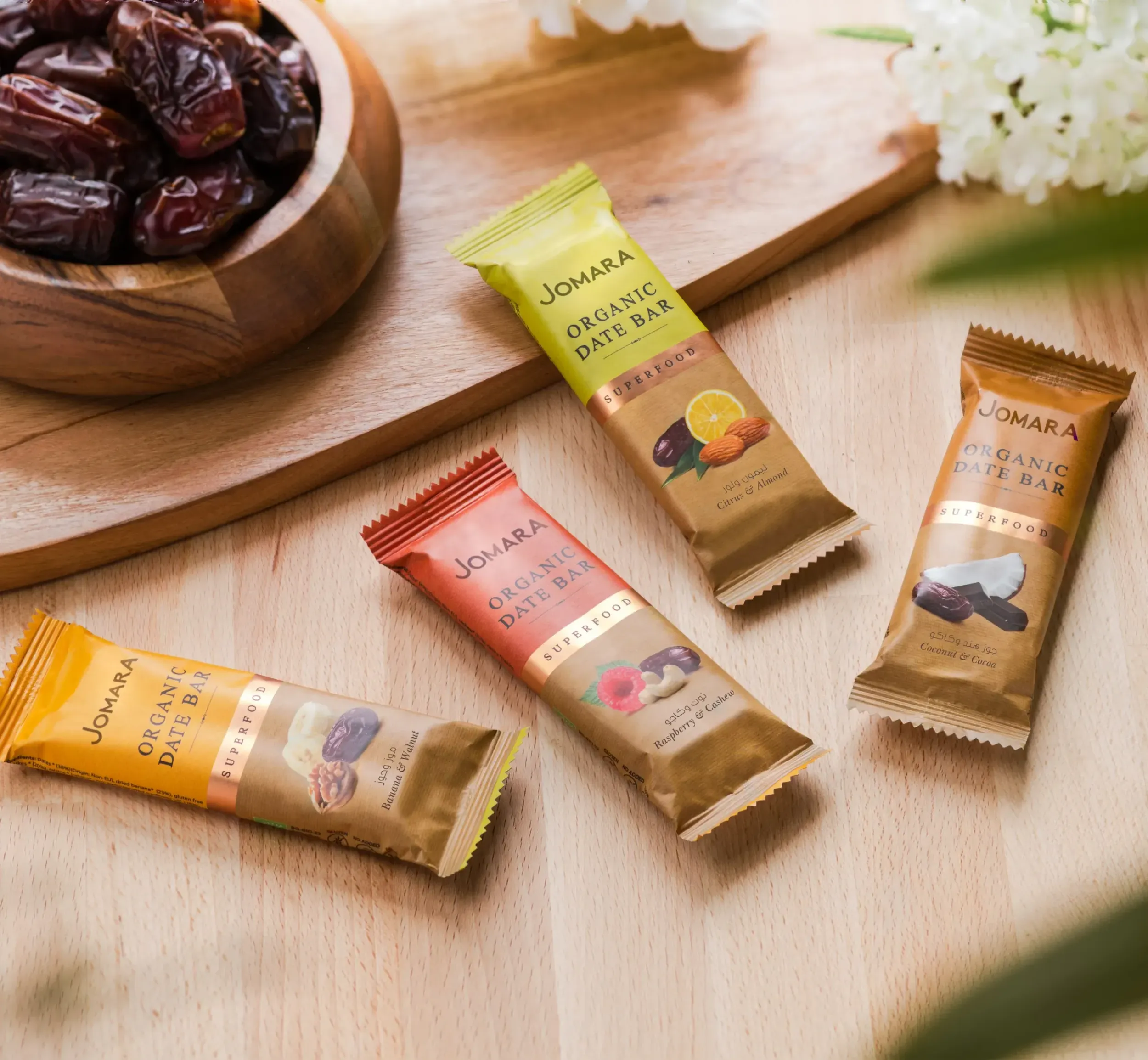 Assorted Jomara date bars with natural ingredients, designed by Skyne, a UAE-based branding agency