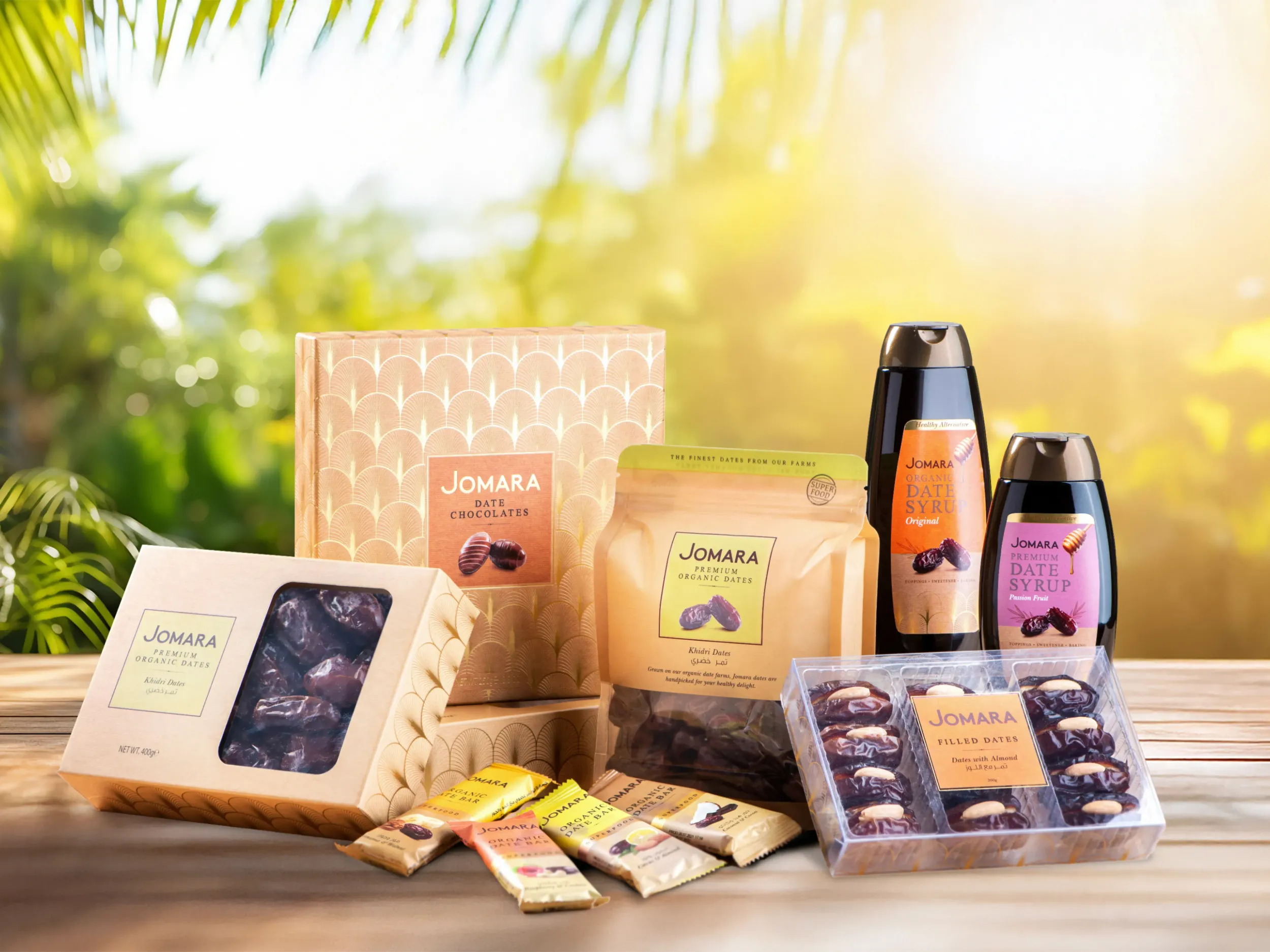 Assortment of Jomara date products, demonstrating comprehensive packaging design and branding strategy by Skyne, a top branding agency in Dubai.