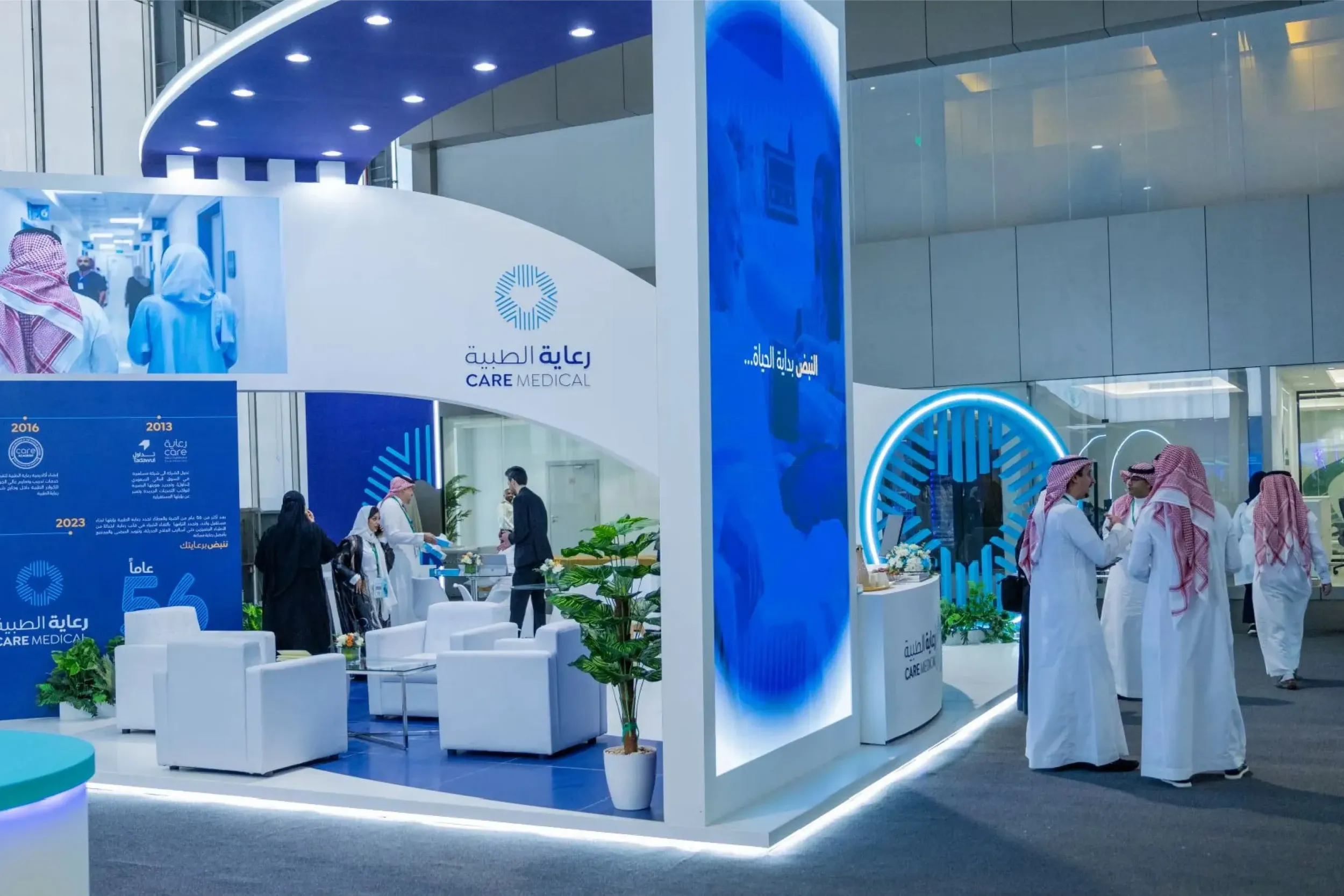 A bustling Care Medical exhibition booth with visitors and staff, demonstrating the effectiveness of Skyne's creative agency work in promoting healthcare brands and improving hospital brand visibility.