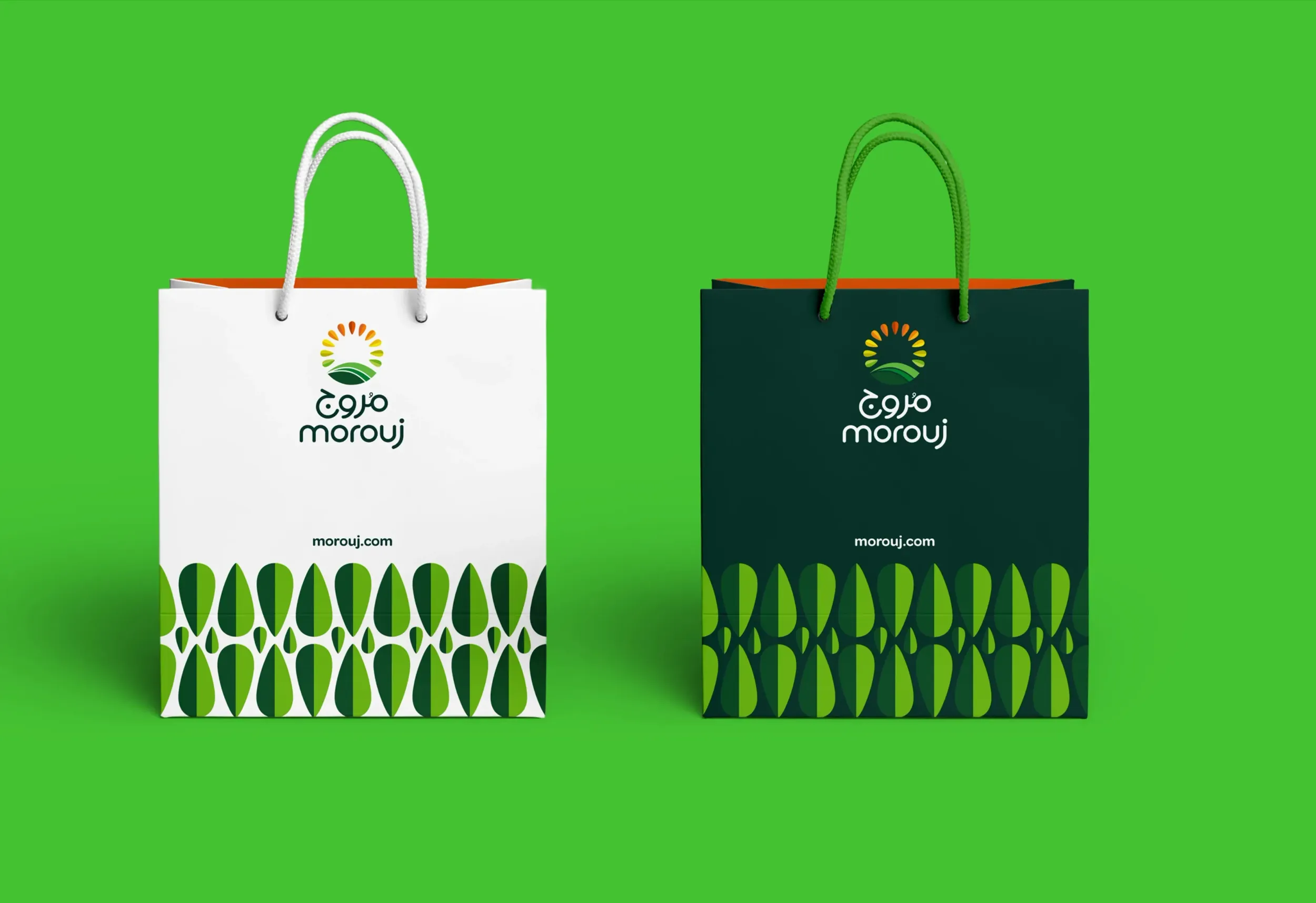 Marooj branded paper shopping bags in white and green, packaging design by Skyne branding agency