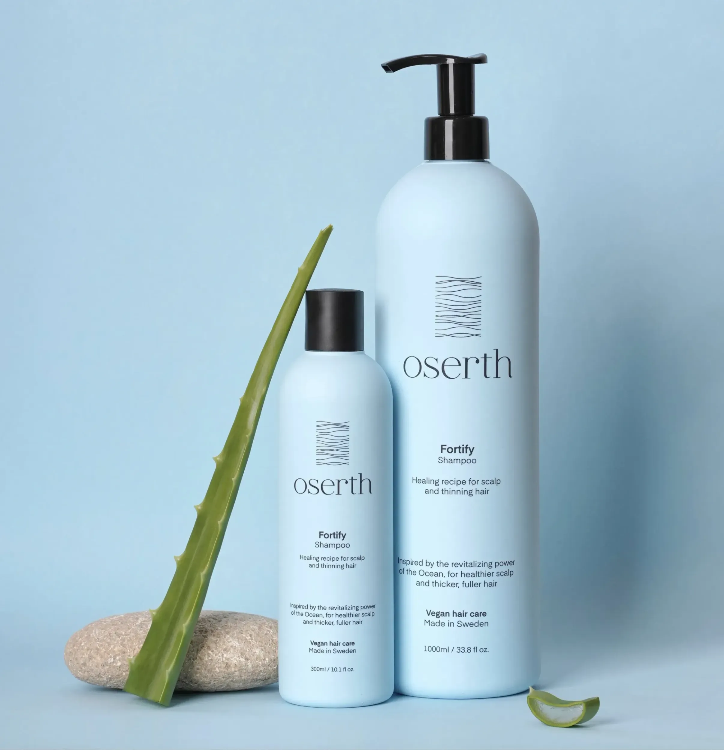  Two Oserth shampoo bottles with aloe vera leaf and natural stones, emphasizing natural ingredients and wellness, reinforced by Skyne’s branding expertise.