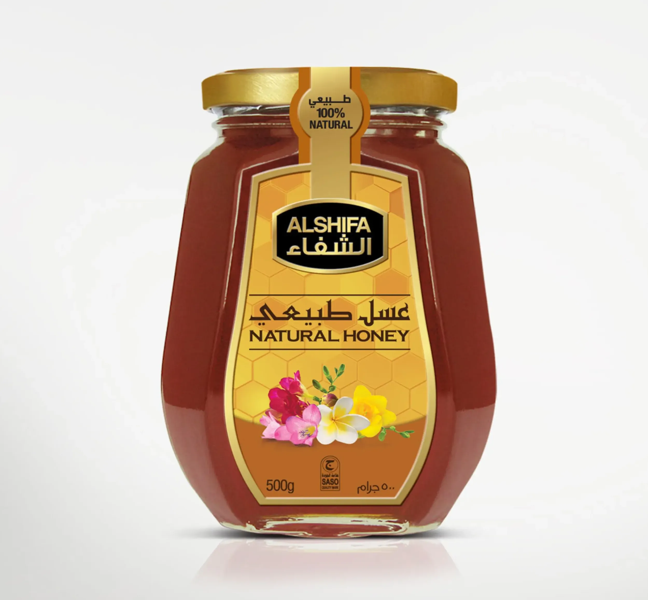 Glass jar of Al Shifa Natural Honey with golden cap and floral label, featuring Arabic and English text on a white background