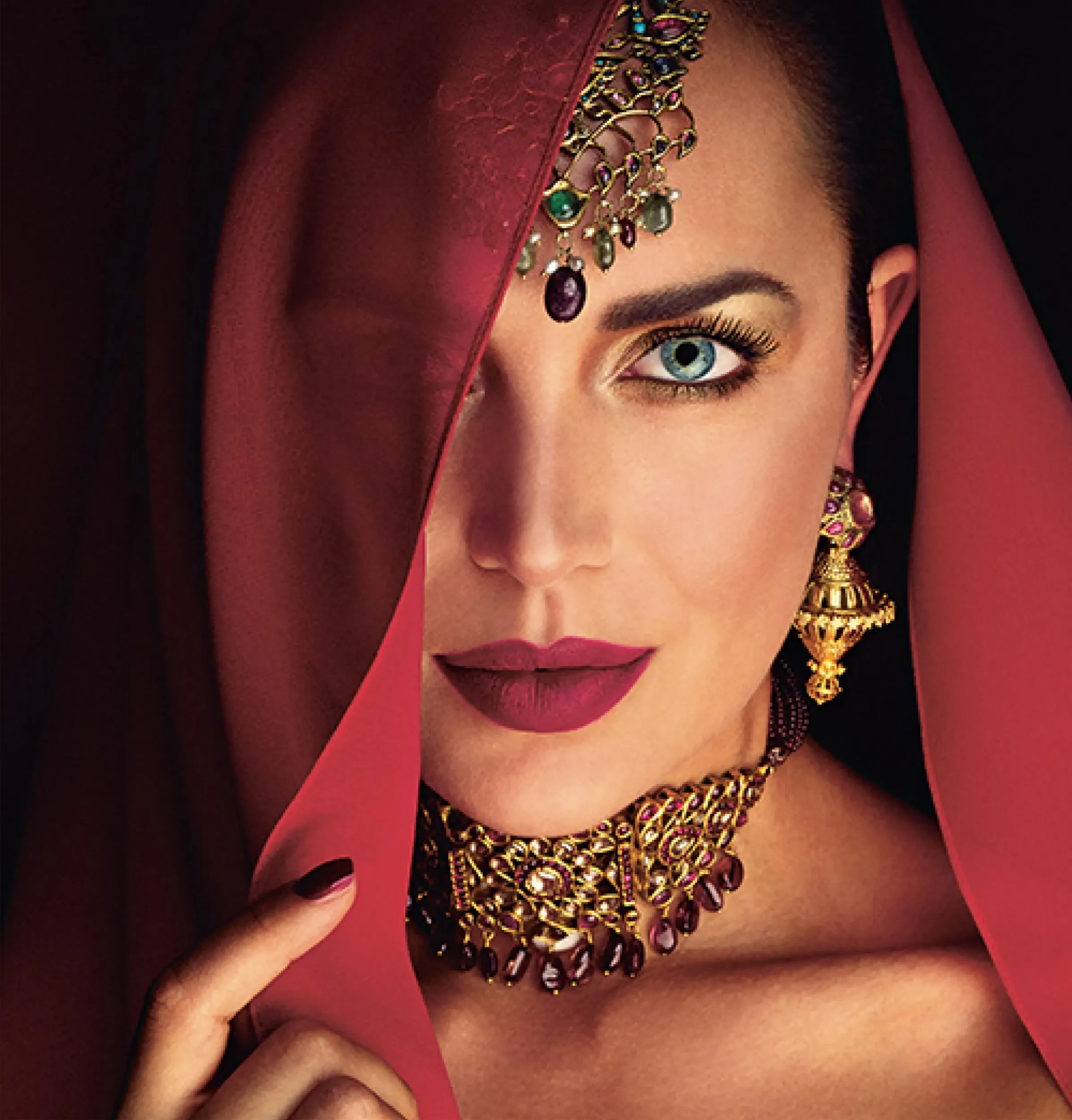 Woman in traditional Middle Eastern jewelry, representing cultural adaptation for Rituals by Skyne, a branding agency in Dubai. Expert branding for global market expansion.