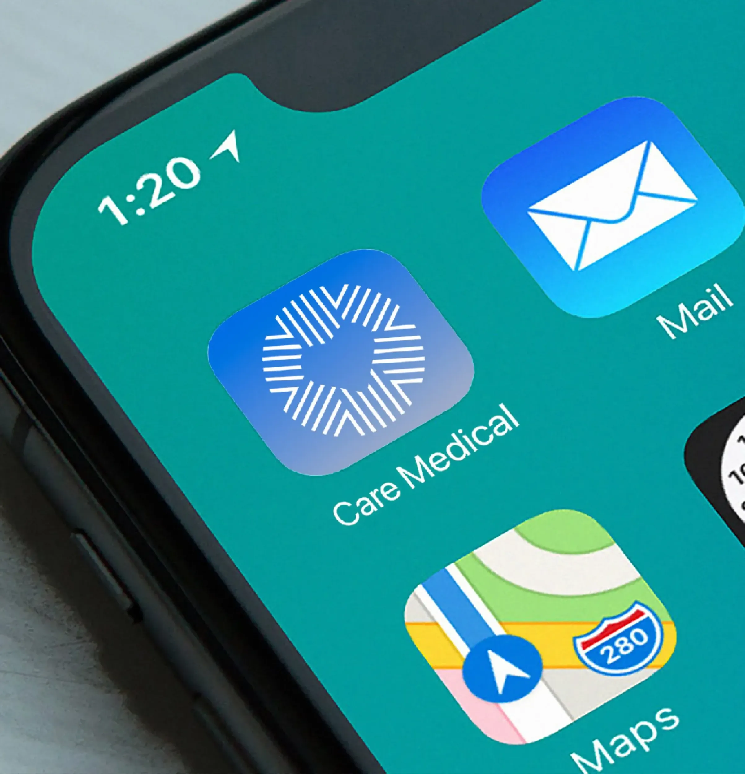 A smartphone screen displaying the Care Medical mobile application icon, a testament to Skyne's comprehensive branding services, including digital presence for healthcare facilities.