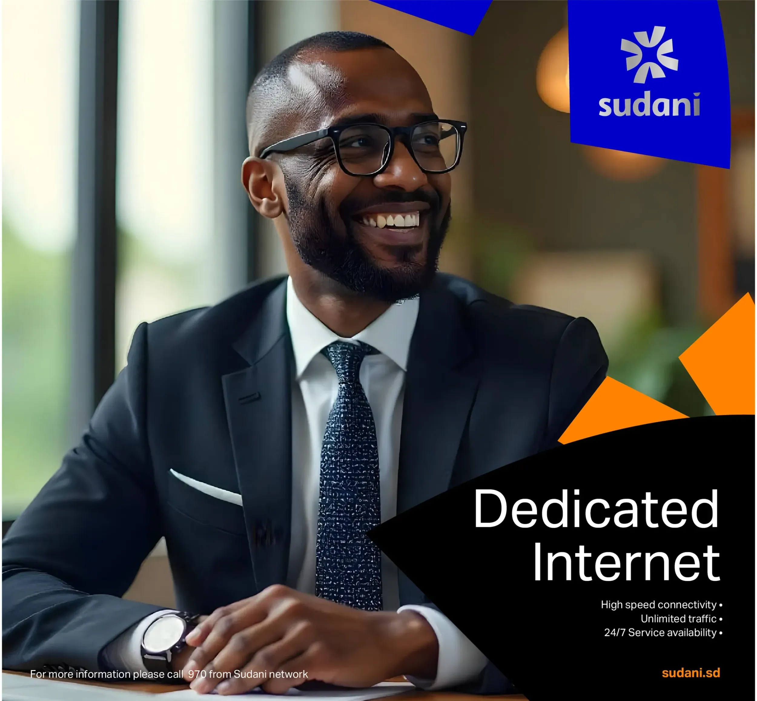 Sudani 'Dedicated Internet' advertisement featuring a smiling businessman, highlighting Skyne's strategic marketing for telecommunications services.