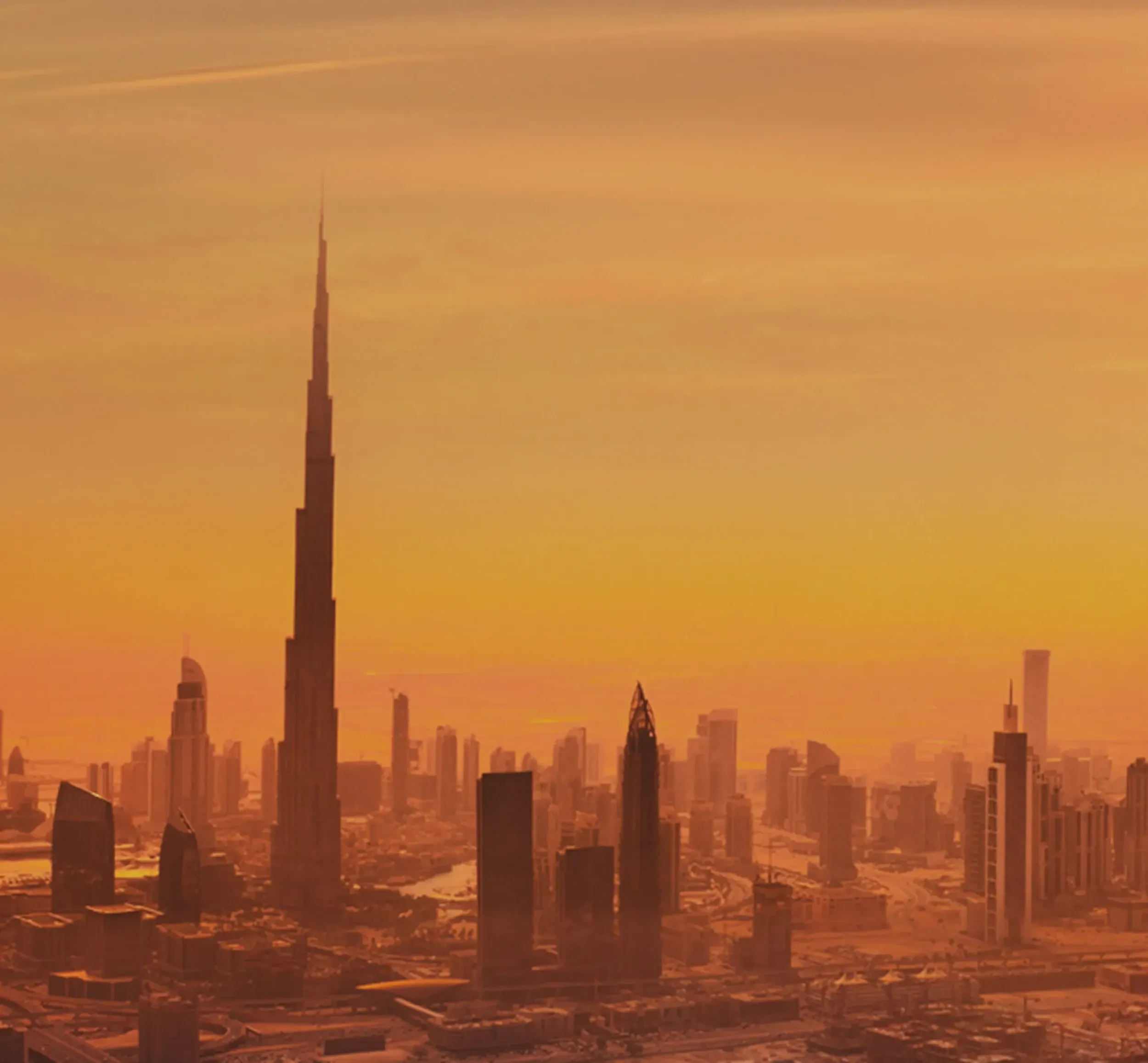 Dubai skyline with Burj Khalifa at sunset, reflecting the city's modernity and luxury. Branding and packaging design expertise for global brands