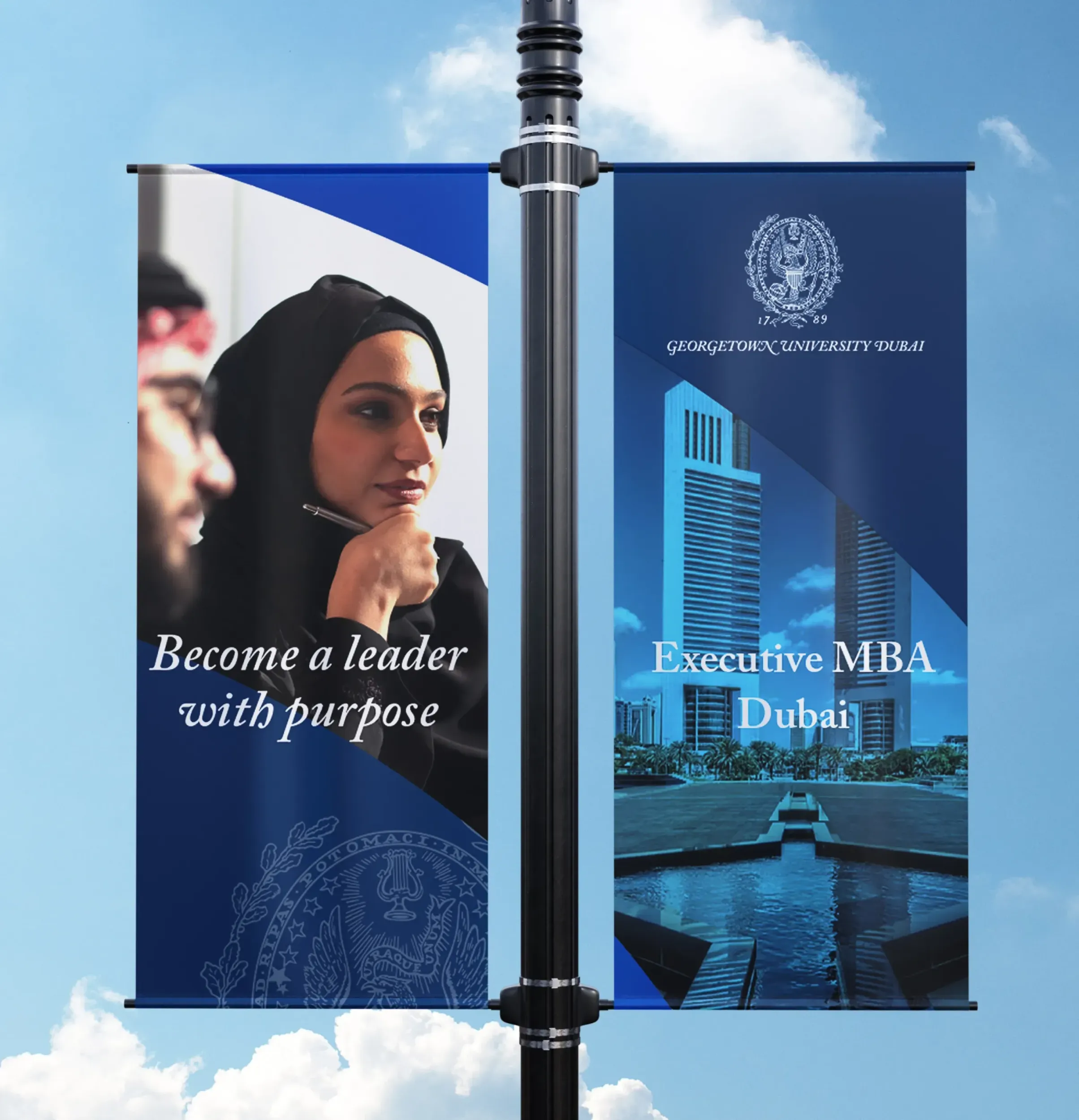 ​ Two street banners for Georgetown University Dubai, featuring a woman in traditional attire and the Dubai skyline. Skyne creates impactful outdoor advertising and visual presence for educational institutions in Dubai, Riyadh, and Jeddah.