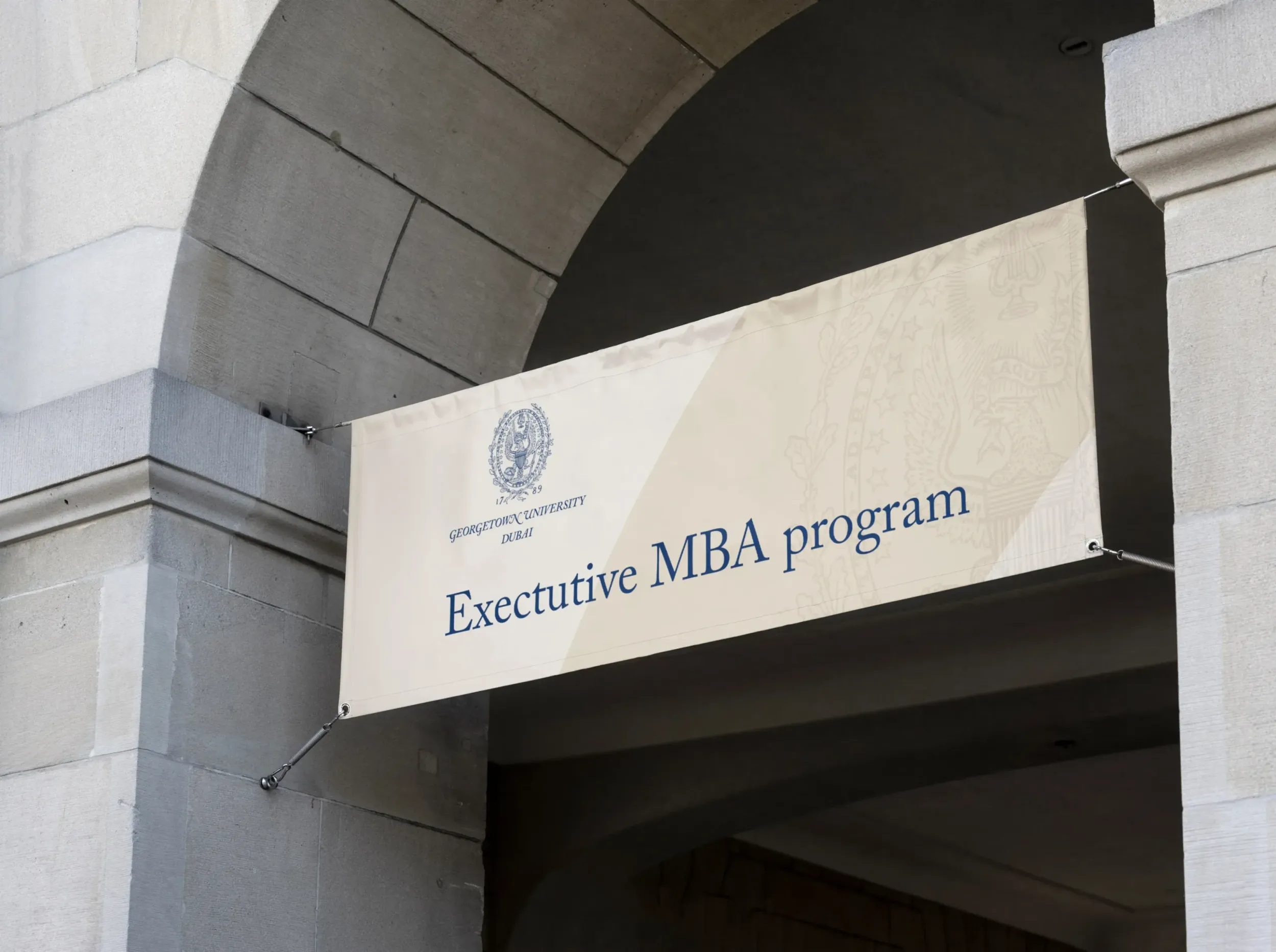 Banner for Georgetown University Dubai Executive MBA program. Skyne, a creative agency, specializes in branding and marketing for executive education programs in Dubai, Riyadh, and Jeddah.